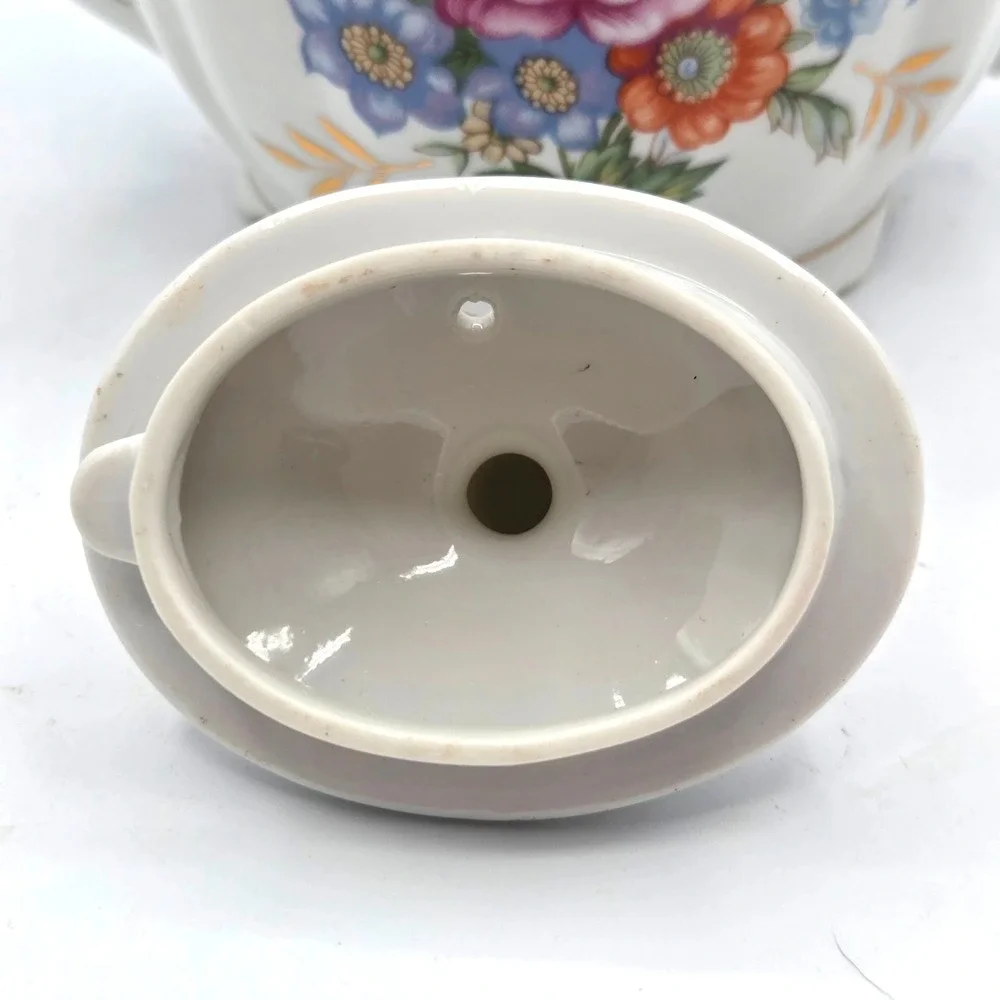 Porcelain Musical Teapot Plays 